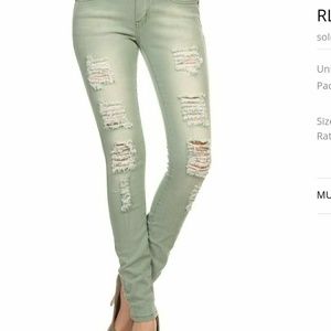 Mint colored distressed Jeans
